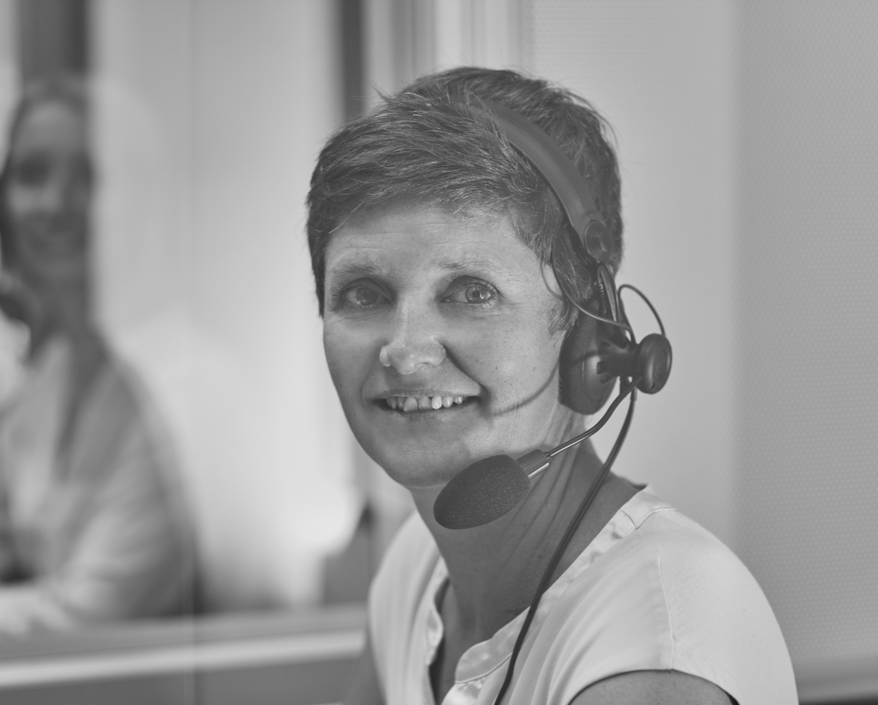 Sabine Kreuzpaintner beim Simultandolmetschen auf einer Konferenz