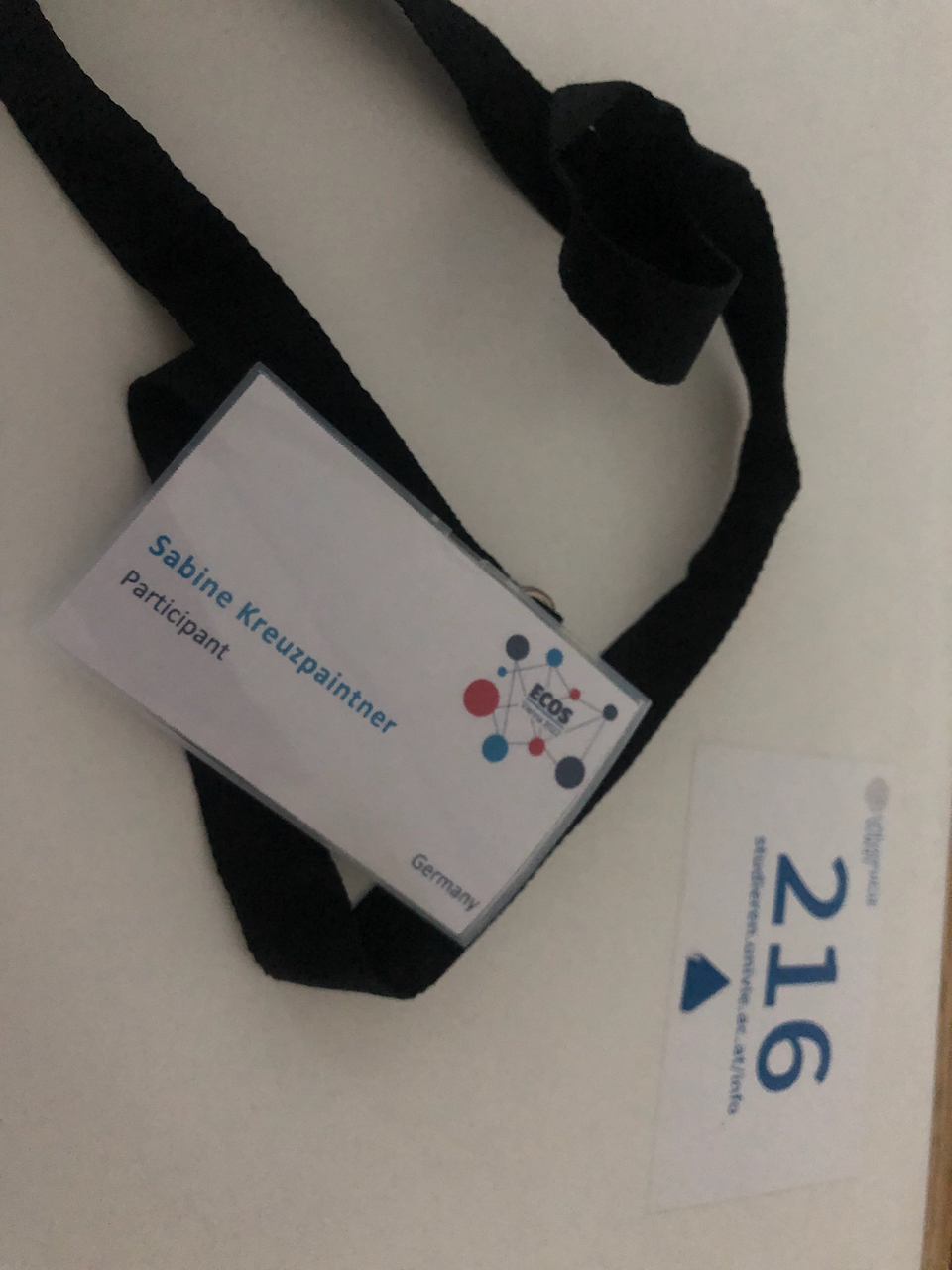 Teilnahmebadge an der ECOS-Konferenz